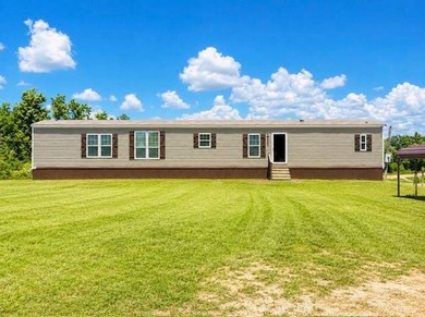 Welcome to your own slice of Toledo Bend! This immaculate 2019 - photo 1