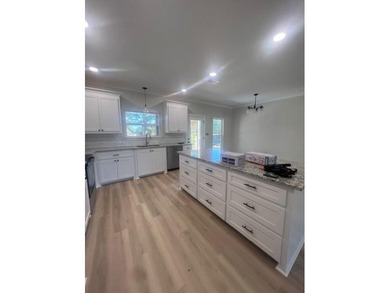 ON THE WATER!!! This beautiful new construction home offers a - photo 12