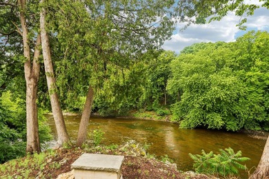 Quality craftsmanship meets stunning riverfront living! Situated - photo 2