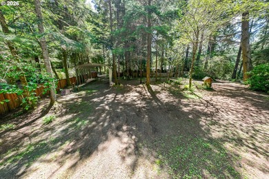 Tucked away in the trees on beautiful Woahink Lake, this rare 1 - photo 6