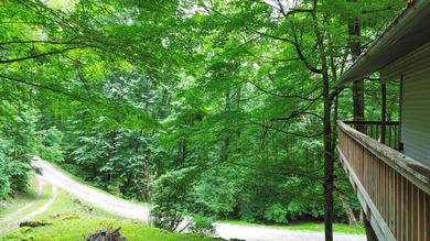Mountain Retreat in Glenville, NC!! Tucked away in the serene - photo 18