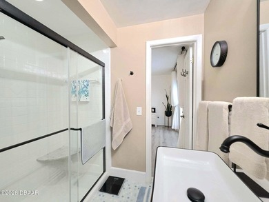 Just steps from the beach, this beautiful home offers the - photo 22