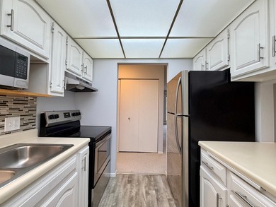 Enjoy comfortable condo living in this top-level unit offering a - photo 8