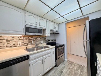 Enjoy comfortable condo living in this top-level unit offering a - photo 9