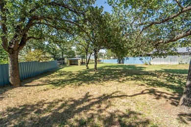 Explore this breathtaking waterfront lot on Hubbard Creek Lake - photo 3
