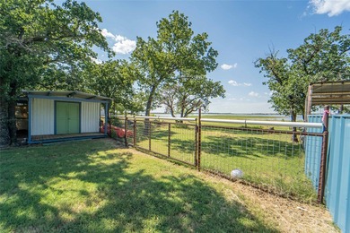 Explore this breathtaking waterfront lot on Hubbard Creek Lake - photo 4