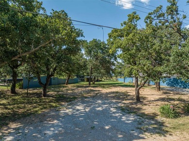Explore this breathtaking waterfront lot on Hubbard Creek Lake - photo 9
