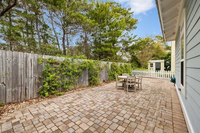 Nestled in a peaceful cul-de-sac, this charming beach cottage - photo 28
