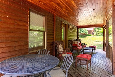Set on 107 feet of pristine, sandy-bottom frontage along Fourth - photo 21