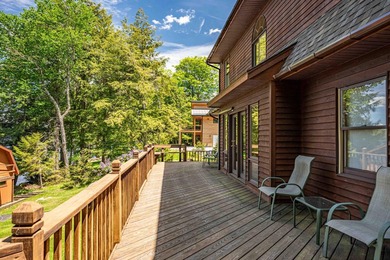 Set on 107 feet of pristine, sandy-bottom frontage along Fourth - photo 22