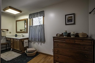 Set on 107 feet of pristine, sandy-bottom frontage along Fourth - photo 46