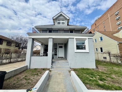 Welcome to this income-producing residential property in the - photo 1
