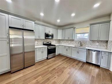 Welcome to this income-producing residential property in the - photo 7