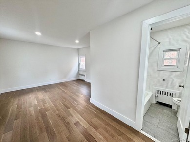 Welcome to this income-producing residential property in the - photo 8