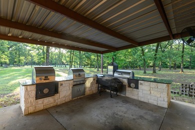 Just 90 minutes from Dallas, this 21-acre waterfront estate on - photo 29