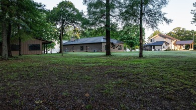 Just 90 minutes from Dallas, this 21-acre waterfront estate on - photo 40