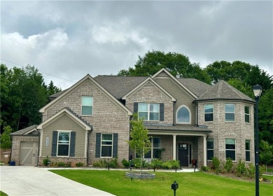 Lake Home For Sale in Cumming, Georgia