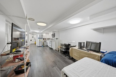 Move right into this lovely renovated two-family townhouse - photo 10