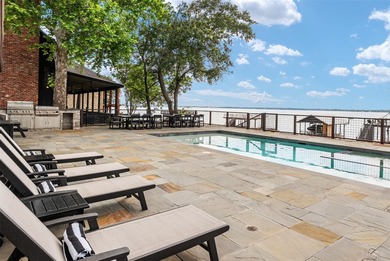 Experience lake living at its finest in this stunning furnished - photo 1