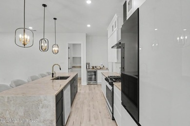 Welcome to this stunning custom-built 2025 home, where modern - photo 12