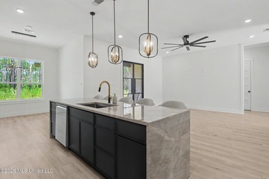 Welcome to this stunning custom-built 2025 home, where modern - photo 14