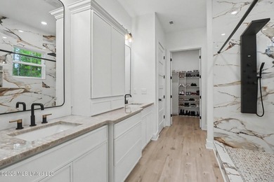 Welcome to this stunning custom-built 2025 home, where modern - photo 18