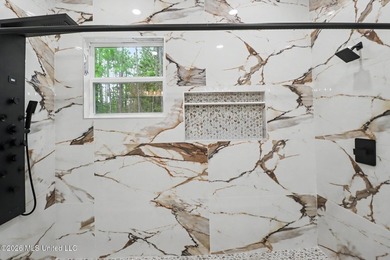 Welcome to this stunning custom-built 2025 home, where modern - photo 19