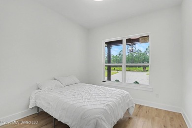 Welcome to this stunning custom-built 2025 home, where modern - photo 25