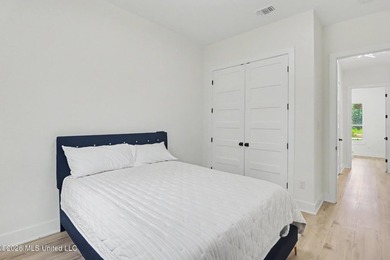 Welcome to this stunning custom-built 2025 home, where modern - photo 26