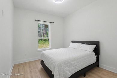 Welcome to this stunning custom-built 2025 home, where modern - photo 27