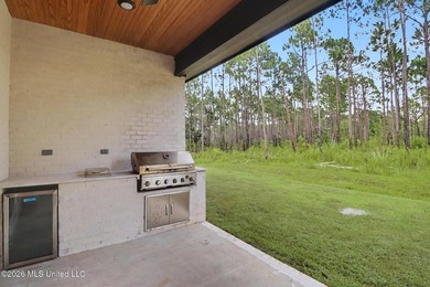 Welcome to this stunning custom-built 2025 home, where modern - photo 33