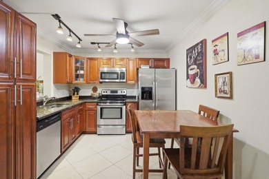 Light, bright & beautifully updated 2/2 villa in the desirable - photo 13