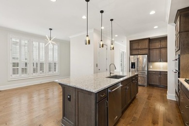 Welcome home to this exceptional John Wieland Craftsman-style