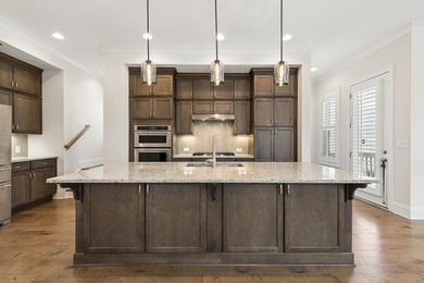 Welcome home to this exceptional John Wieland Craftsman-style