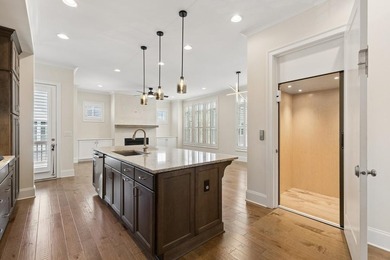 Welcome home to this exceptional John Wieland Craftsman-style