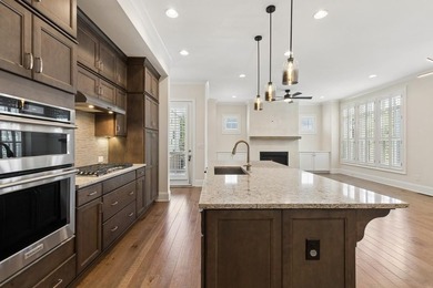 Welcome home to this exceptional John Wieland Craftsman-style