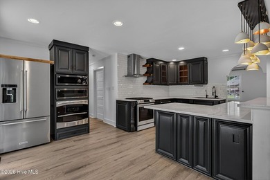 Completely reimagined and beautifully renovated, this stunning - photo 16