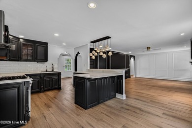 Completely reimagined and beautifully renovated, this stunning - photo 17