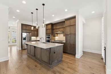 Welcome home to this exceptional John Wieland Craftsman-style