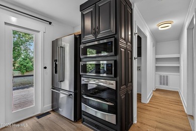 Completely reimagined and beautifully renovated, this stunning - photo 22