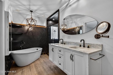 Completely reimagined and beautifully renovated, this stunning - photo 30