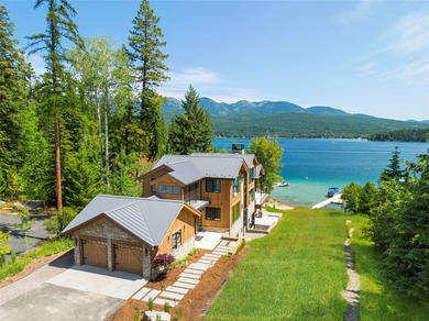 Peak Lakeside Luxury! Built by Malmquist Construction, this - photo 2