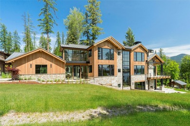 Peak Lakeside Luxury! Built by Malmquist Construction, this - photo 5