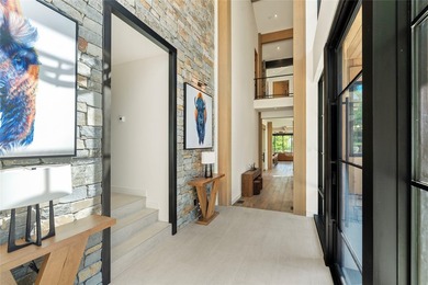 Peak Lakeside Luxury! Built by Malmquist Construction, this - photo 7