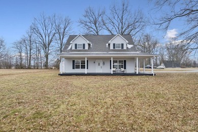 Ready to live the lake life? This beautiful remodeled Cape Cod - photo 2