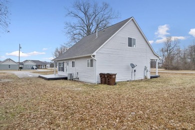 Ready to live the lake life? This beautiful remodeled Cape Cod - photo 4