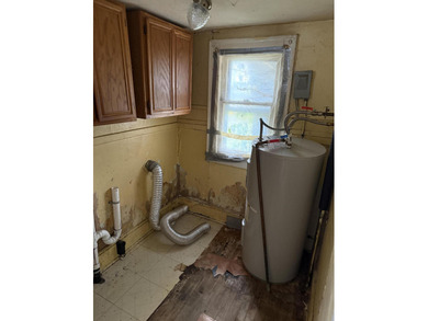 Opportunity knocks! This home is just around the corner from the