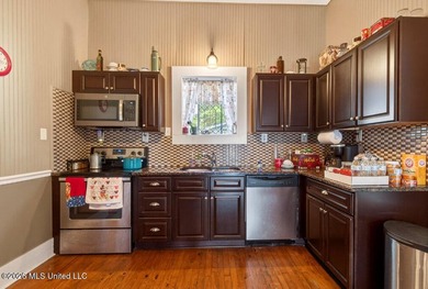 Charming 3 bedroom, 2 bath home. This property features original - photo 13