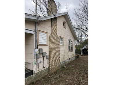 Opportunity knocks! This home is just around the corner from the