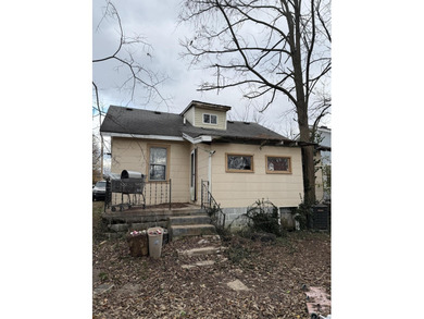 Opportunity knocks! This home is just around the corner from the